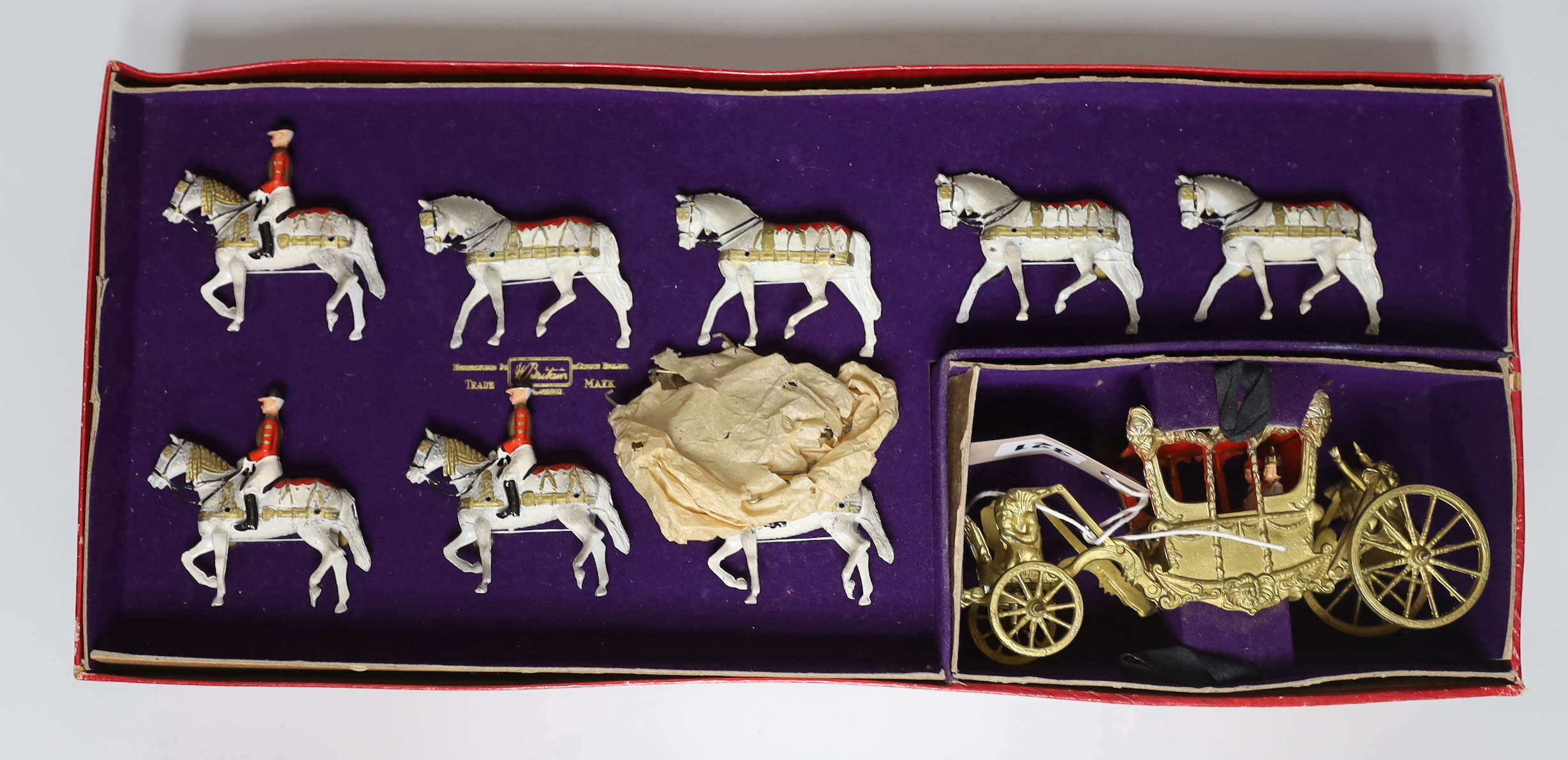 A cased set of a 1953 Coronation Coach and eight horses from Britain’s Historical Series by W. Britain